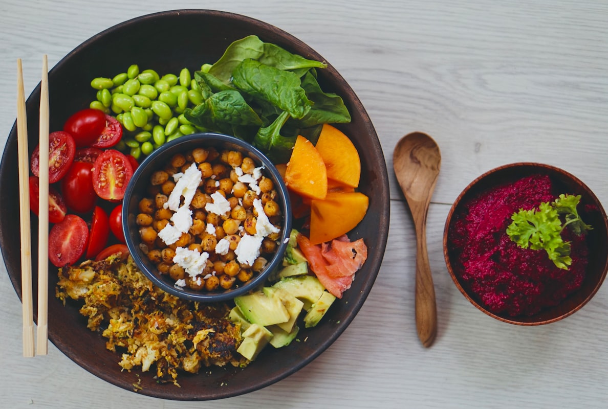 Raw vegetable salad with avocado and hemp seeds